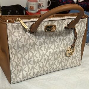 Gently used brown and cream MK logo bag.